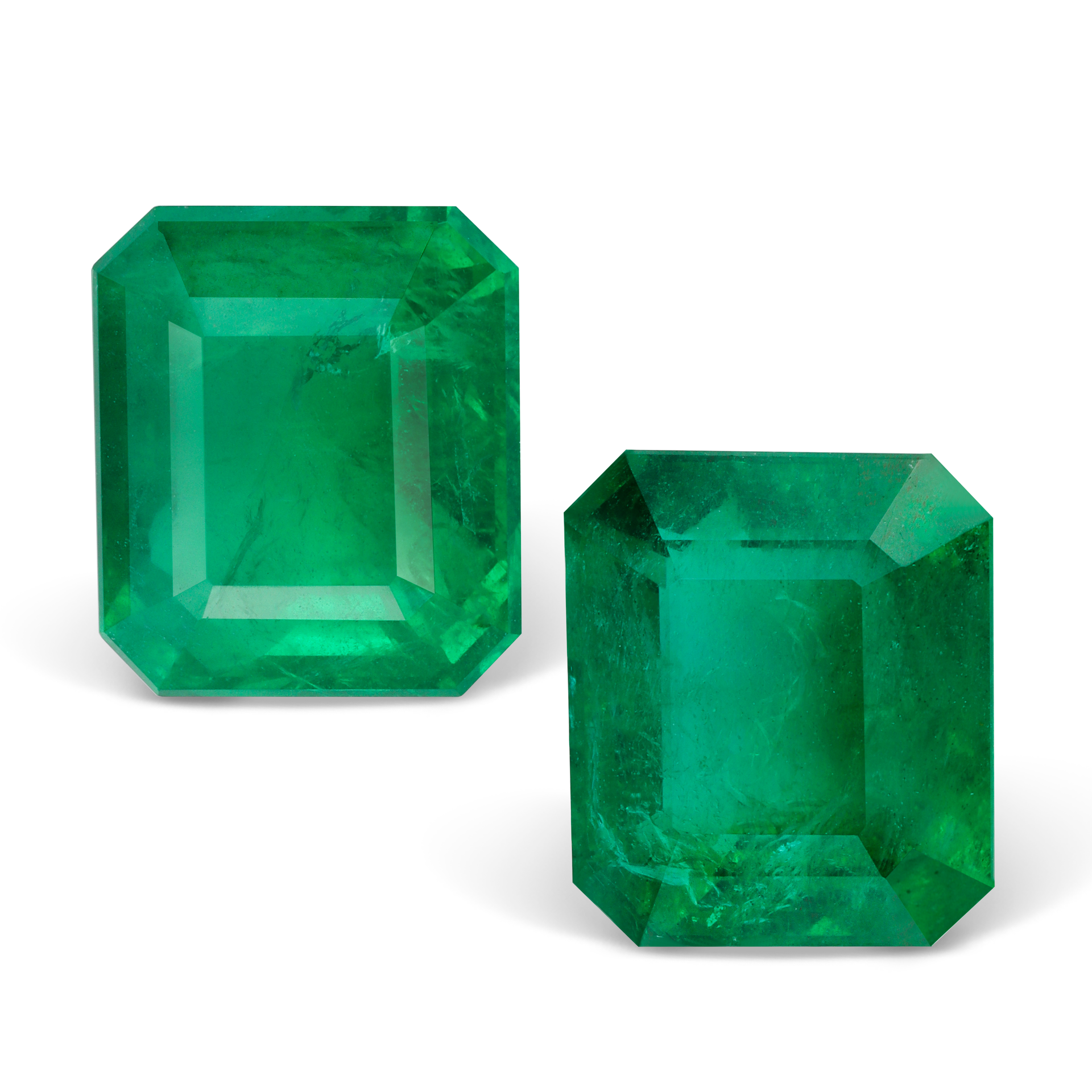 Пара изумрудов 4.22 и 3.54 карат с центральным изумрудом 3.54 кт