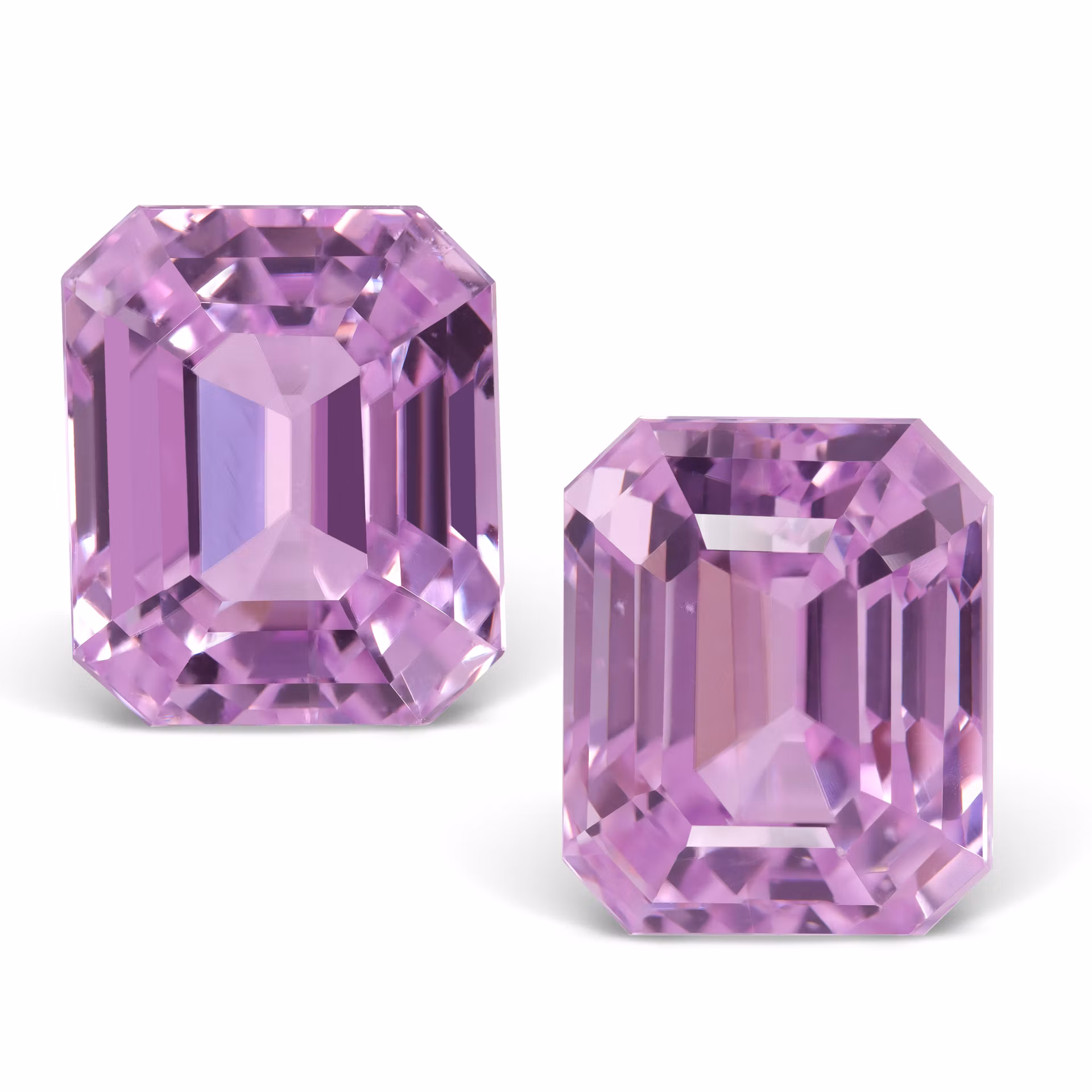 Пара кунцитов 13.20 и 11.87 карат с центральным камнем 13.2 кт