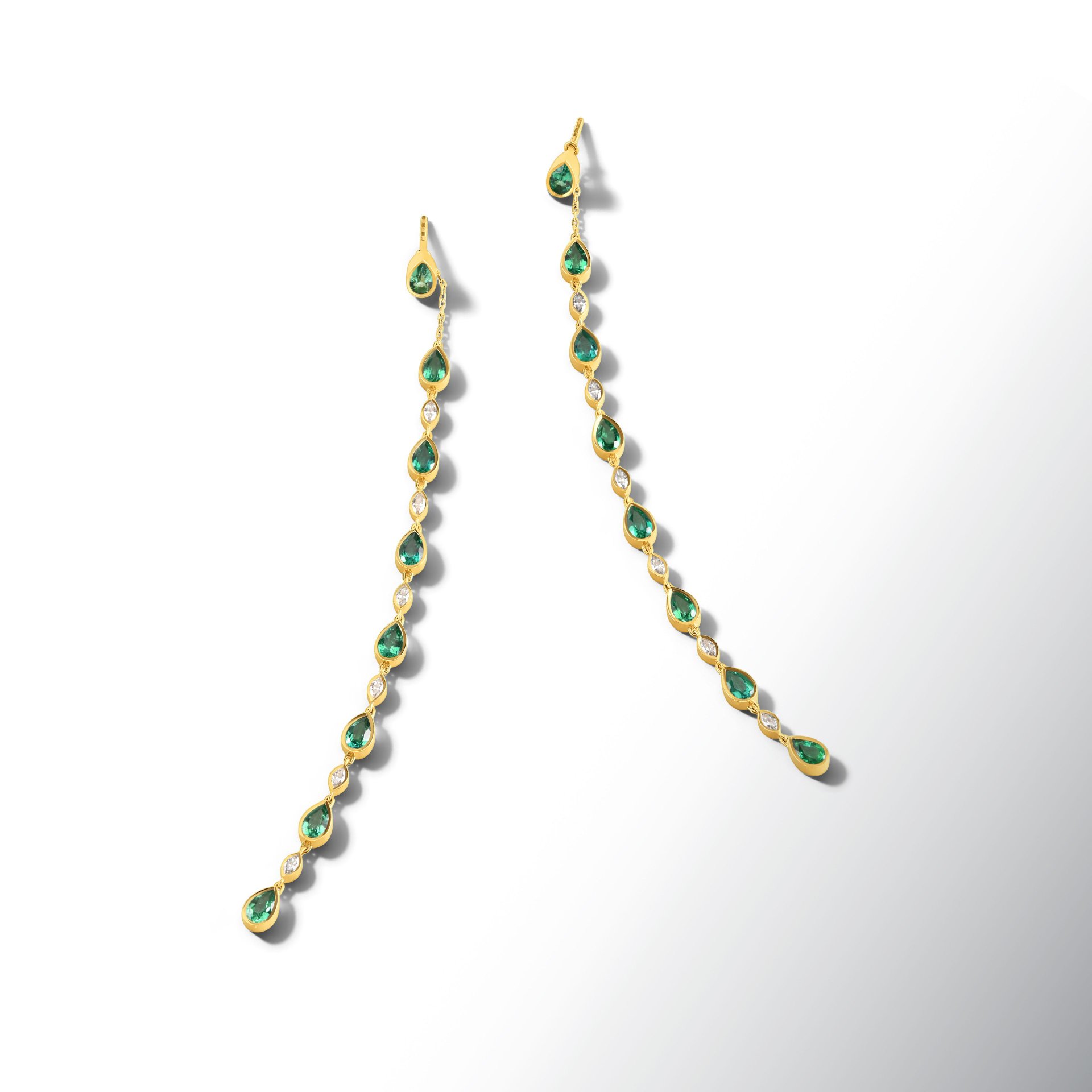 Серьги-трансформеры с изумрудами и бриллиантами в желтом золоте.