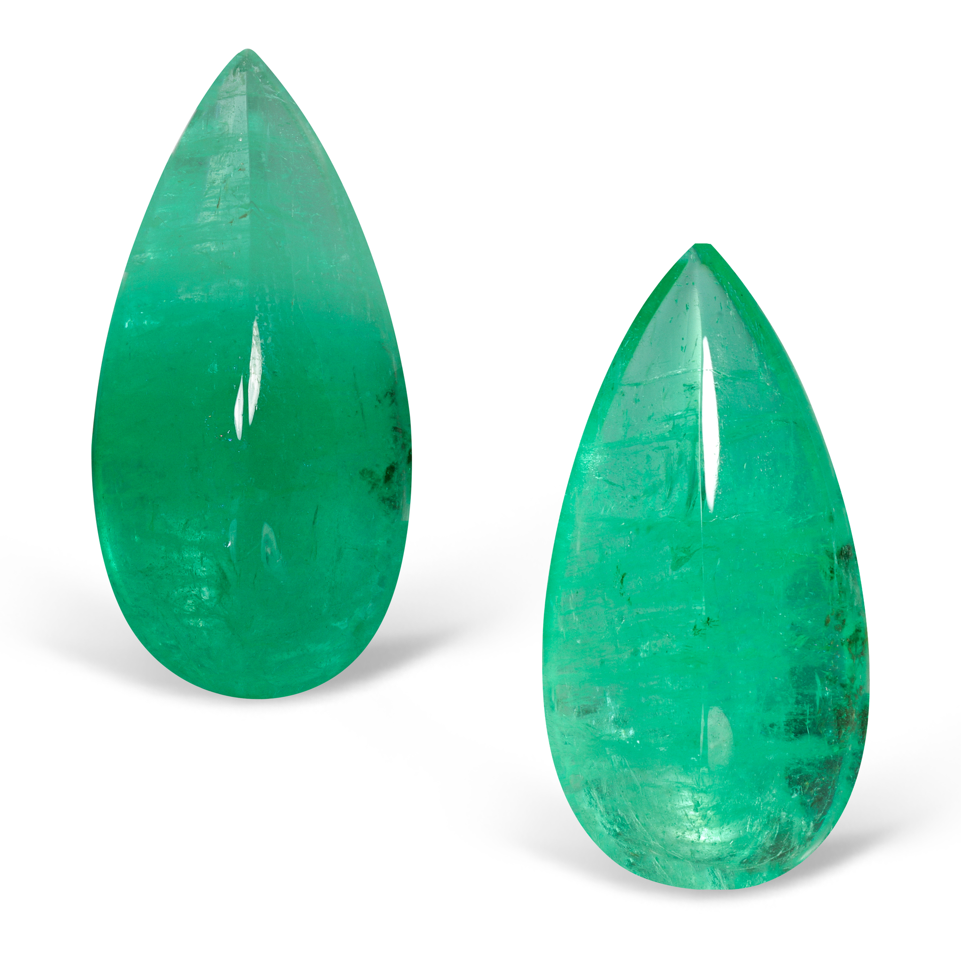 Пара уральских изумрудов 24.04 и 20.97 карат, центральный камень 24.04 кт