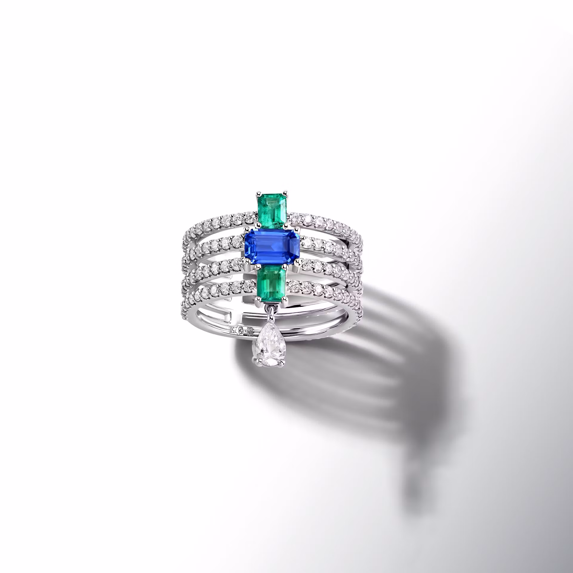 Кольцо на мизинец с бриллиантом 0.533 кт, изумрудами и сапфиром в белом золоте